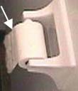 Toilet paper positioned over the front